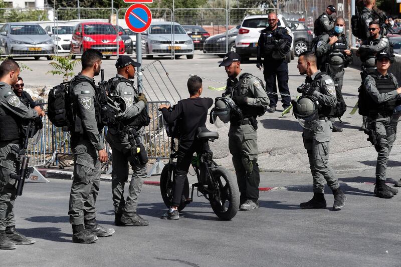 Israeli border police block a road into Sheikh Jarrah. EPA