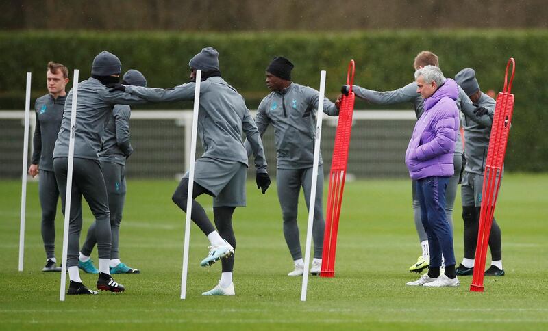 Tottenham Hotspur manager Jose Mourinho watches on. Reuters