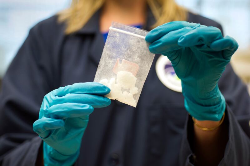 Fentanyl seized in a drug raid is displayed at the Drug Enforcement Administration Special Testing and Research Laboratory in Sterling, Virginia. AP