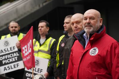 Aslef general gecretary Mick Whelan, right, on a picket line at Euston station in London. PA