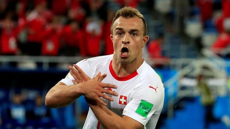 Switzerland's Xherdan Shaqiri celebrates scoring their second goal against Serbia in the World Cup. Reuters