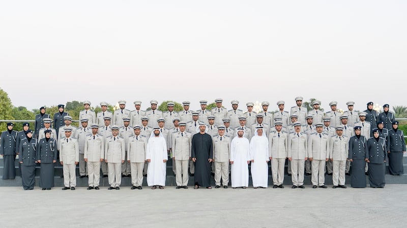 AL AIN, ABU DHABI, UNITED ARAB EMIRATES - December 04, 2017: HH Sheikh Mohamed bin Zayed Al Nahyan, Crown Prince of Abu Dhabi and Deputy Supreme Commander of the UAE Armed Forces (front row 10th R), stands for a photograph with members of Abu Dhabi Police, during a barza, at Al Maqam Palace. Seen with HE Major General Mohamed Khalfan Al Romaithi ,Commander in Chief of Abu Dhabi Police and Abu Dhabi Executive Council Member (front row 11th R) and HE Brigadier Maktoum Ali Al Sharifi, Acting Director General of Abu Dhabi Police (front row 9th R).

( Rashed Al Mansoori / Crown Prince Court - Abu Dhabi )
---