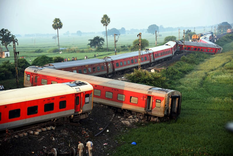 Carriages of the North East Express passenger train that derailed on Wednesday night near Raghunathpur station in Bihar state, eastern India. AP
