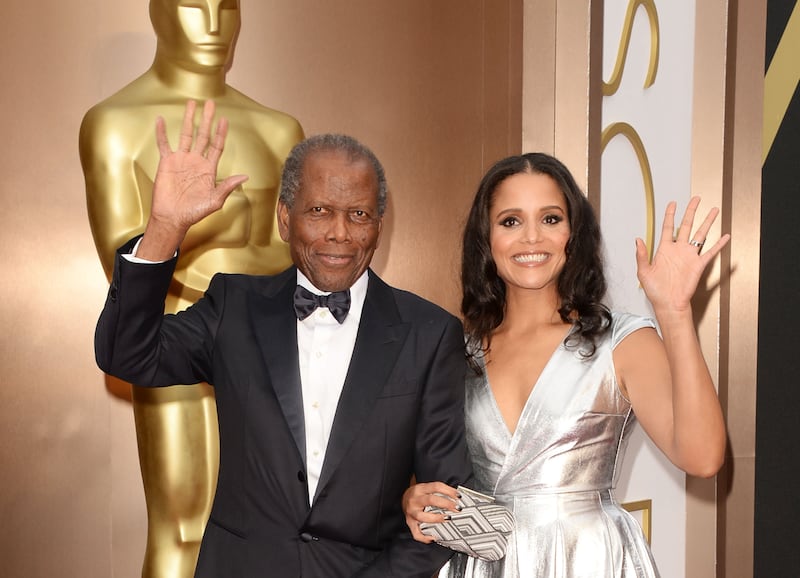 Sidney Poitier was the first black man to win a Best Actor Oscar in the history of the Academy Awards. He is pictured here with Sydney Tamiia Poitier at the Oscars in 2014. Getty Images
