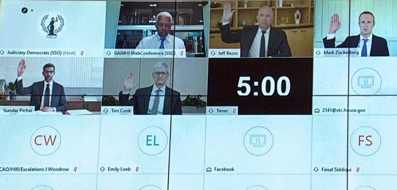Amazon CEO Jeff Bezos, Facebook CEO Mark Zuckerberg, Google CEO Sundar Pichai and Apple CEO Tim Cook all raise their hands to be sworn in to testify remotely via video conference. Reuters