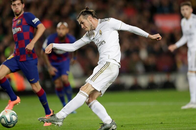 Real Madrid's Gareth Bale goes for goal during the Spanish La Liga match between Barcelona and Real Madrid at Camp Nou. AP
