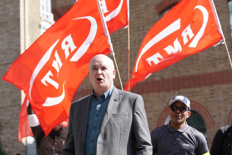 Mick Lynch on a picket line outside King's Cross St Pancras station in London.