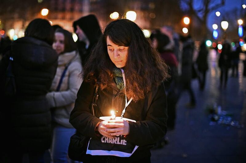 A candlelit vigil was held in Paris on January 9 in memory of the 12 victims of the country's recent terrorist attacks. Jeff J Mitchell/Getty Images