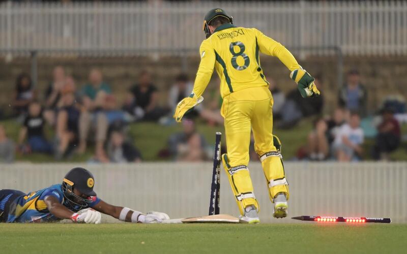 Sri Lanka's Wanindu Hasaranga is run out during the warm-up match in Canberra. Getty Images