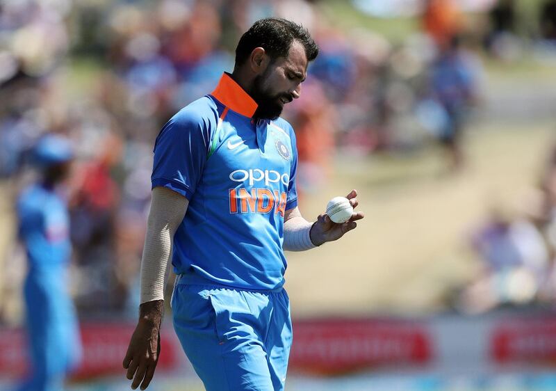 (FILES) In this file photo taken on January 28, 2019, India's Mohammed Shami prepares to bowl during the third one-day international cricket match between New Zealand and India at Bay Oval in Mount Maunganui. Indian police filed charges on March 14 against fast bowler Mohammed Shami, who has been accused of various crimes including assault and sexual harassment by his estranged wife. / AFP / MICHAEL BRADLEY
