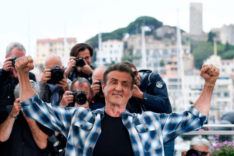 Sylvester Stallone gestures during a photocall for 'Rendez-vous with… Sylvester Stallone' and 'Rambo V : Last Blood' at the 72nd edition of the Cannes Film Festival. AFP/Christophe Simon