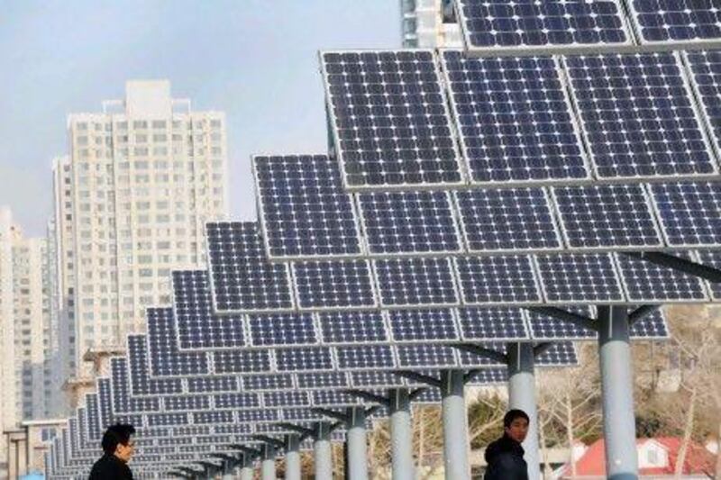 A line of solar power panels installed for public electricity supply in Shenyang, China. AFP