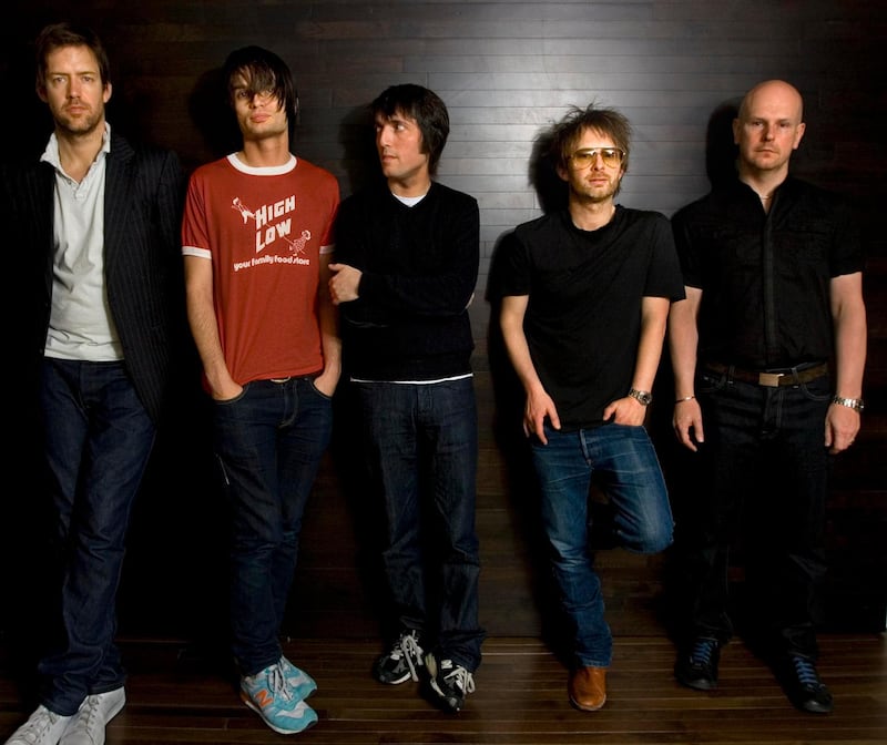 Radiohead band members, from left, Ed O'Brien, guitar, Jonny Greenwood, lead guitar, Colin Greenwood, bass guitar, Thom Yorke, lead vocalist, and drummer Phil Selwayan pose in their hotel room, Tuesday, May 13, 2008, in Washington. (AP Photo/J. Scott Applewhite)
