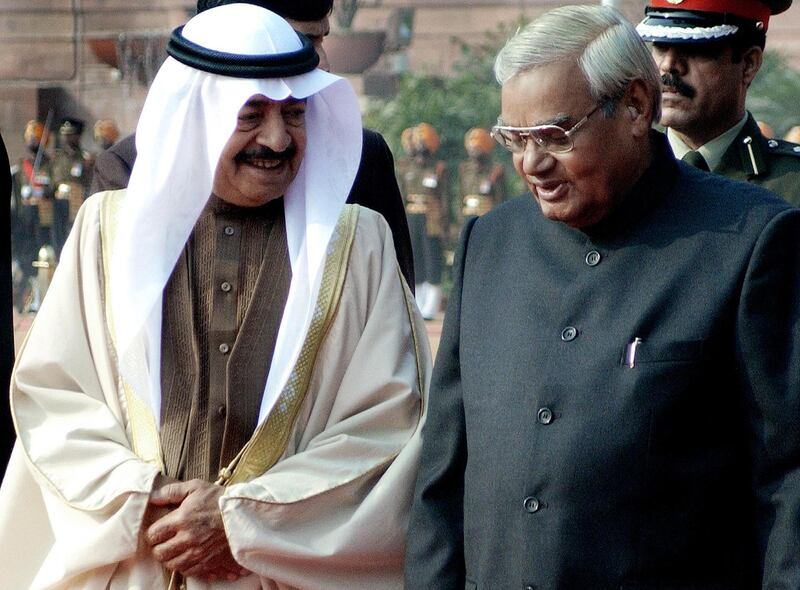 Prime Minister of Bahrain Sheikh Khalifa bin Salman Al-Khalifa (L), speaks with Indian Prime Minister Atal Behari Vajpayee at the Presidential palace in New Delhi, 13 January 2004. Khalifa is on a four-days official visit to India. (Photo by RAVI RAVEENDRAN / AFP)