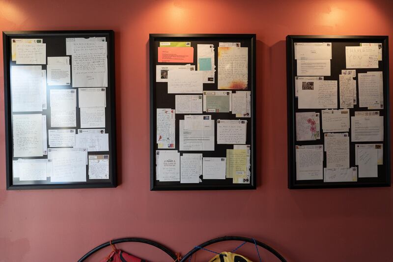 Framed thank you cards hang in Ruhel Islam's temporary restaurant location. Willy Lowry / The National