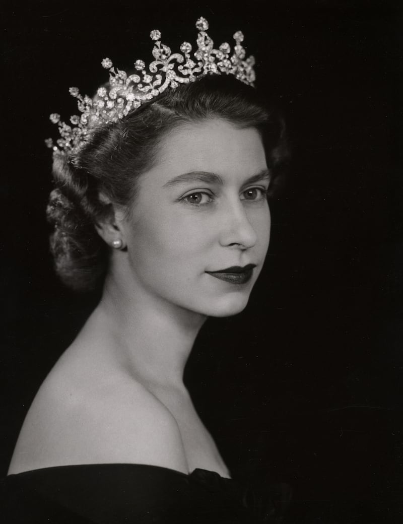 This portrait, issued by the Royal Collection Trust, was taken by photographer Dorothy Wilding in 1952, and is featured in the Platinum Jubilee: The Queen's Accession exhibition, on view at Buckingham Palace until October 2. Photo: Royal Collection Trust