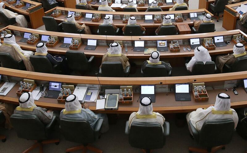 Kuwaiti lawmakers attend the opening session of the new parliament in Kuwait City, on October 30, 2018. / AFP / Yasser Al-Zayyat
