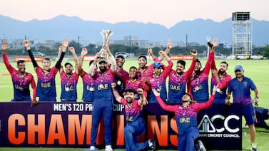 UAE celebrate with the ACC Men's Premier Cup trophy following their 55-run win over Oman in Al Amerat, Muscat. Photo: Subas Humagain for The National