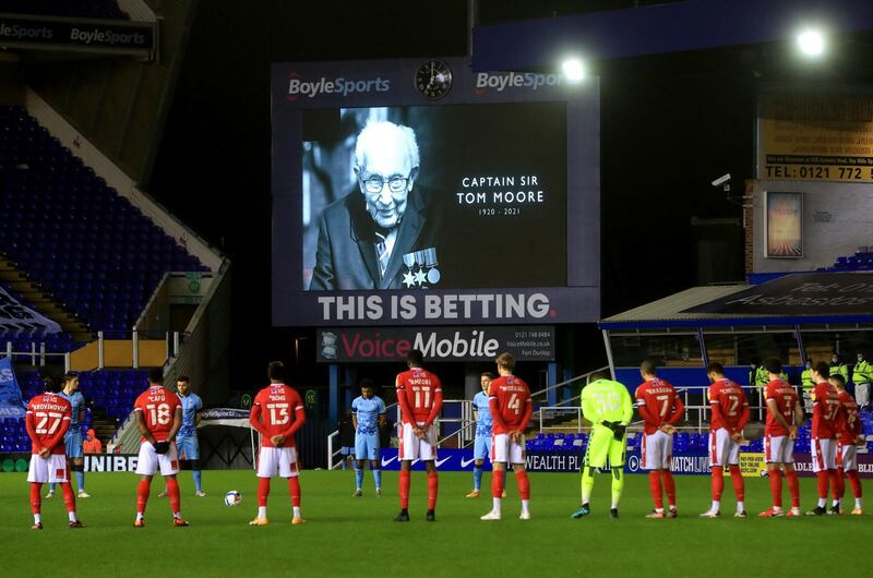 Coventry City and Nottingham Forest players observe a minute's silence in memory of Captain Sir Tom Moore, who died after testing positive for Covid-19, before the Sky Bet Championship match at St. Andrew's Trillion Trophy Stadium, Birmingham. PA Photo