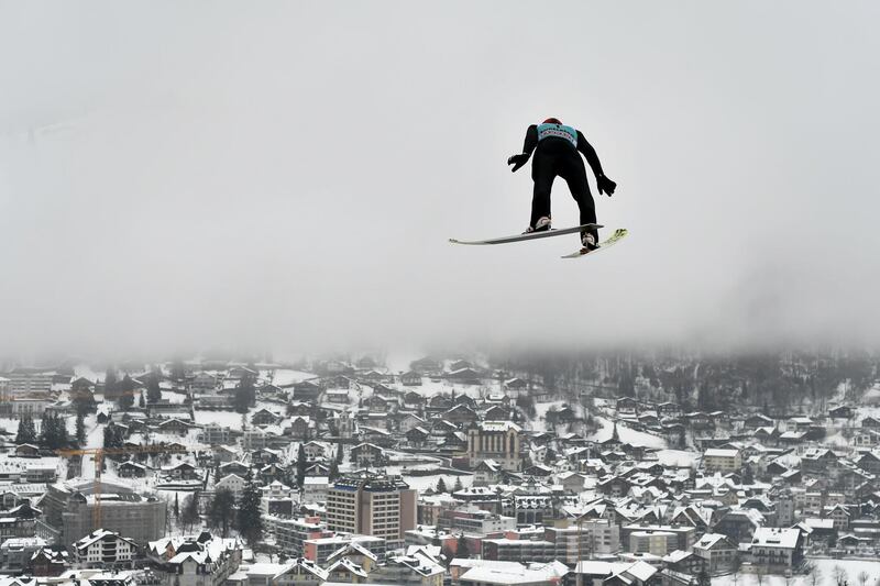 Kazakhstan's Sabirzhan Muminov soars through the air during the men's FIS Ski Jumping World Cup competition in Engelberg, central Switzerland. AFP