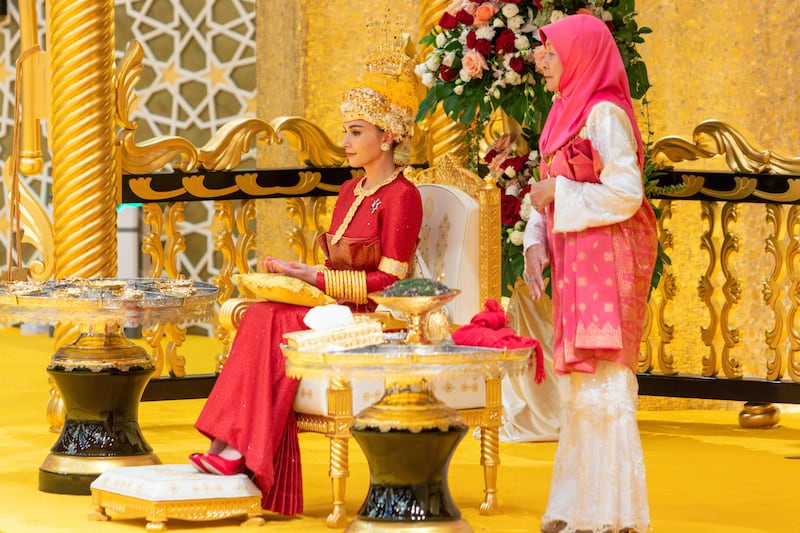 Prince Abdul Mateen's bride Anisha Rosnah during the royal powdering ceremony. AFP