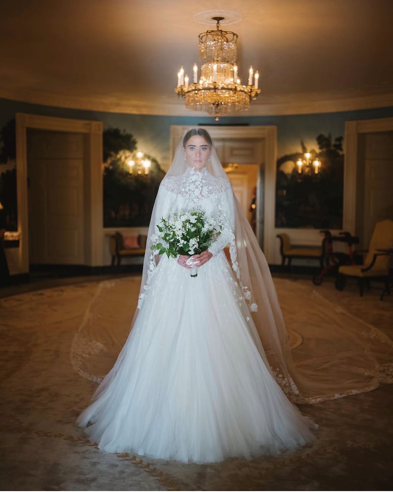 Ms Biden poses before her wedding at the White House. Photo: John Dolan