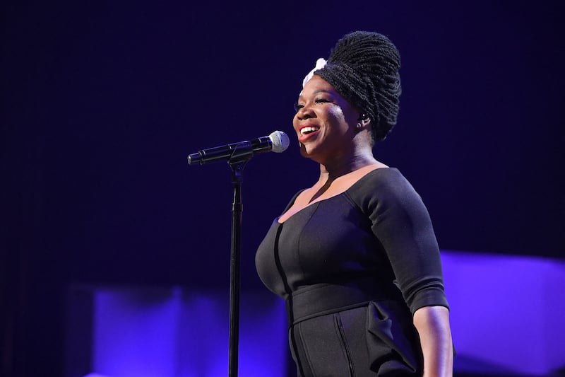 India Arie has joined the fray, saying she's removing her content because she has issues with Rogan's 'language around race'. AFP