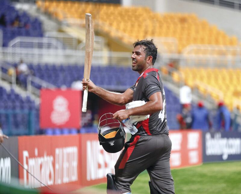 Abu Dhabi, United Arab Emirates, October 27, 2019.  
T20 UAE v Canada-AUH-
-- Mohammad Usman of the UAE team raises his bat to the crowd.
Victor Besa/The National
Section:  SP
Reporter:  Paul Radley