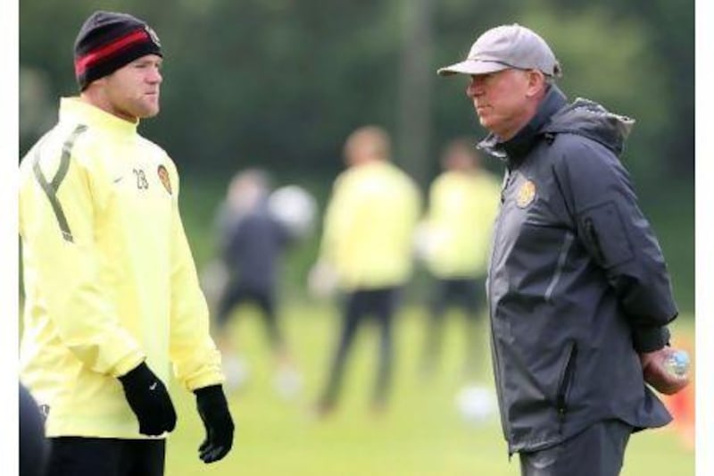 Sir Alex Ferguson, right, has given Wayne Rooney and his teammates a bit of grandfatherly advice this week - turn off your computers and Blackberries and pick up a good book instead.