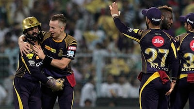 <p>Kolkata Night Riders captain Dinesh Karthik, left, has not put a foot wrong this year. Bikas Das / AP Photo</p>
