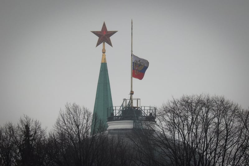The flag of the President of Russia flies at half mast over the Kremlin as the country observed a day of mourning on Sunday. AP