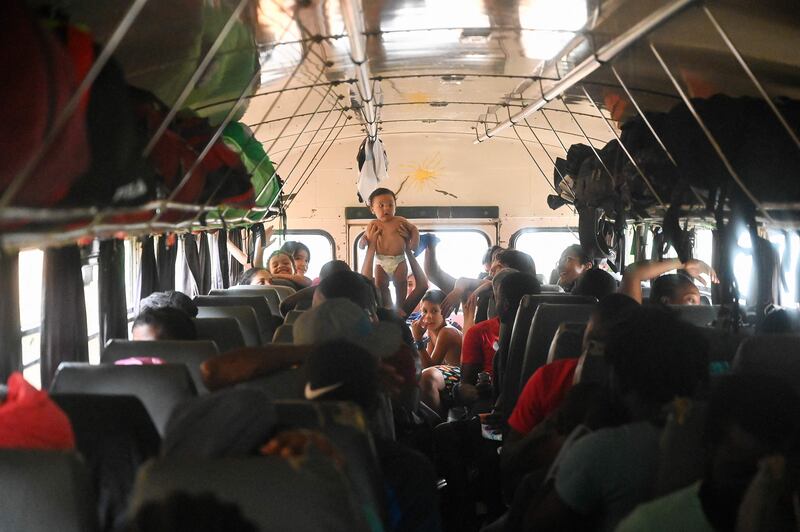 Migrants heading to the US on board a bus heading towards the US-Mexico border. EPA
