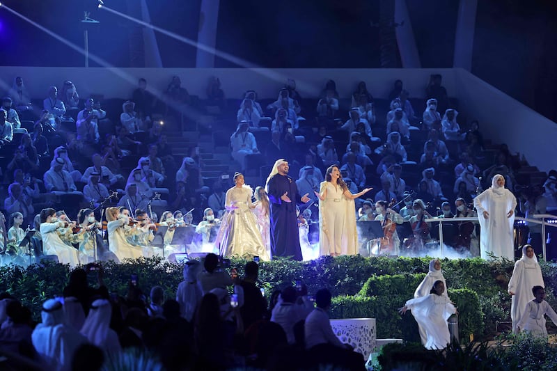 Hussain Al Jassmi, Mayssa Karaa and Almas perform during the opening ceremony of Expo 2020 Dubai. AFP