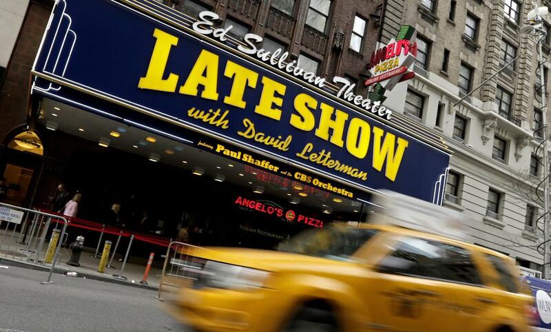 A taxi drives by the Ed Sullivan Theater where the Late Show with David Letterman is televised in New York. EPA