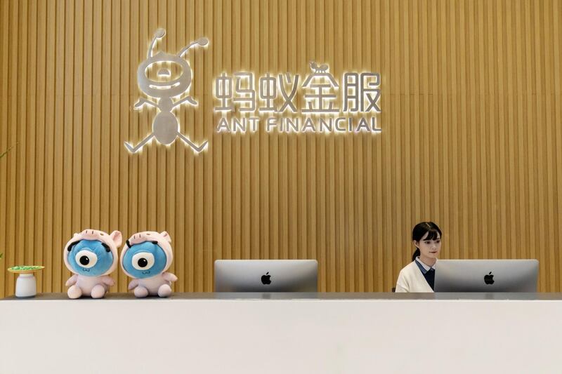 An employee works at a reception counter in the lobby of the Ant Financial headquarters in Hangzhou, China, on Thursday, Oct. 17, 2019. Ant, the Chinese online finance giant controlled by billionaireÂ Jack Ma, continues to see strong credit demand among small and mid-sized enterprises despite a cooling economy. Photographer: Qilai Shen/Bloomberg