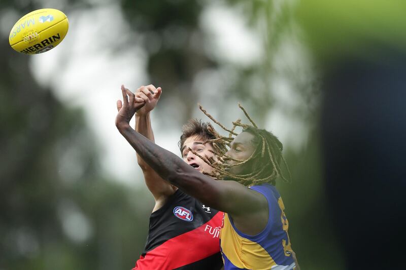 Brynn Teakle, of the Essendon Bombers contests a ruck with  West Coast Eagles' Nic Naitanui during the 2020 Marsh Community Series Australian rules football match, at Mineral Resources Park in Perth, on Thursday, February 27. Getty