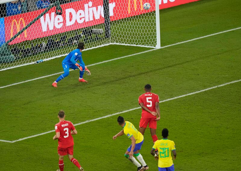 Brazil's Casemiro watches his shot hit the back of the net. AP