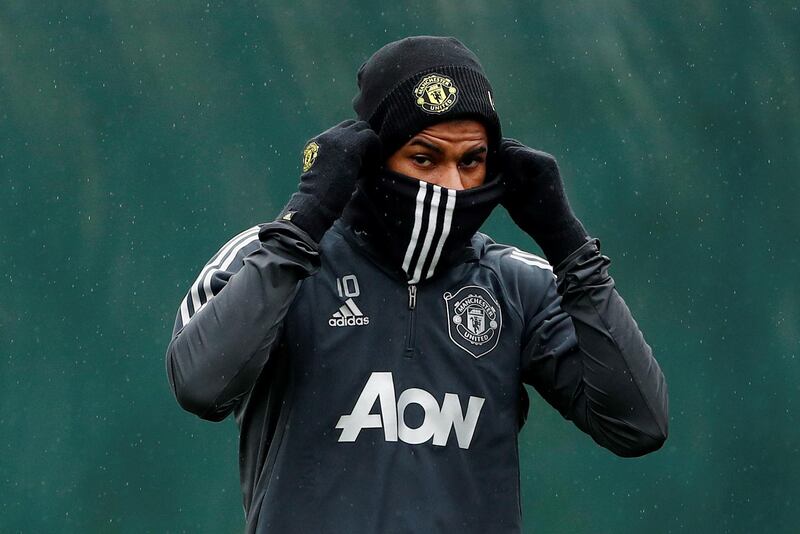 Marcus Rashford is feeling the chill during training for Manchester United's Europa League game. Reuters