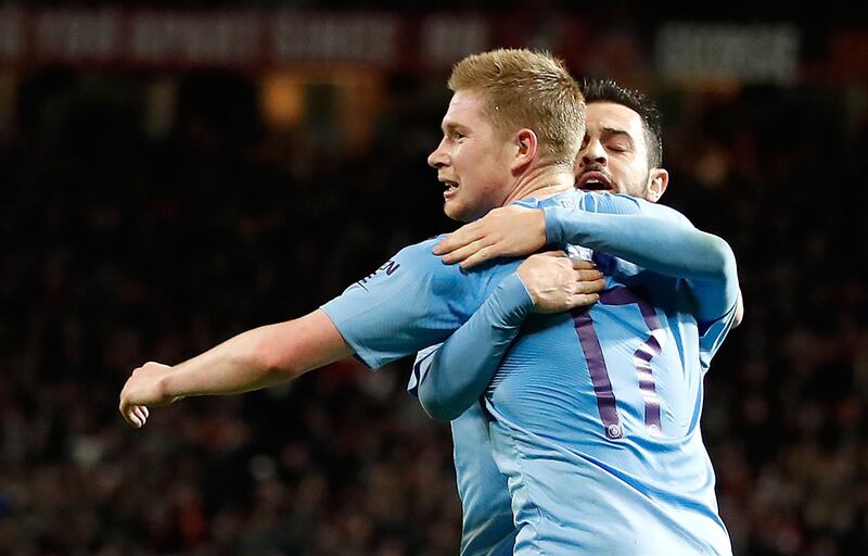 Kevin De Bruyne celebrates after his shot is turned in by Manchester United's Andreas Pereira. PA