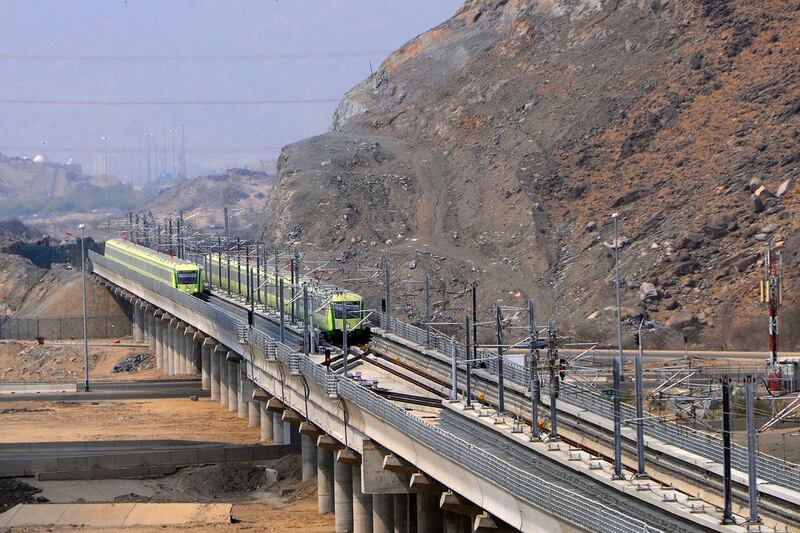 Above, the newly-opened Holy Sites metro light rail in Mecca. Amer Hilabo / AFP