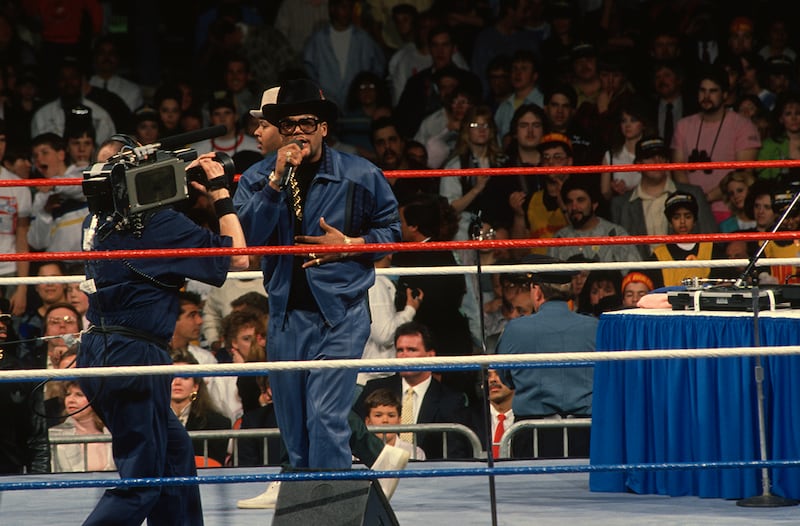 Run-DMC at WrestleMania V at Trump Plaza, Atlantic City, New Jersey on April 2, 1989. Run-DMC performed the WrestleMania rap, a song they created specifically for the event. One of the most influential groups in rap music history, Run-DMC were the first rap group to win a Grammy Award.