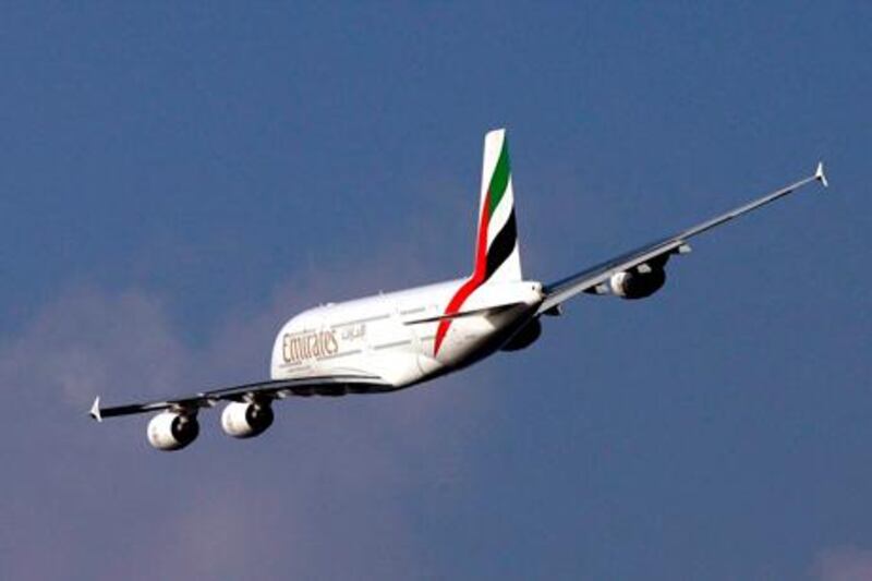 epa01561913 An Airbus A380 of the airline Emirates performs a fly over Dubai, United Arab Emirates, 27 November 2008. Airbus has been awarded 'Aviation Spares & Logistics Provider of the Year' on 27 November 2008 at the second Annual Aviation Business Awards in Dubai. The awards recognise airlines, airport operators and aviation service providers that have helped to establish the countries of the Gulf Corporation Council (GCC) as industry leaders on the global stage.  EPA/ALI HAIDER