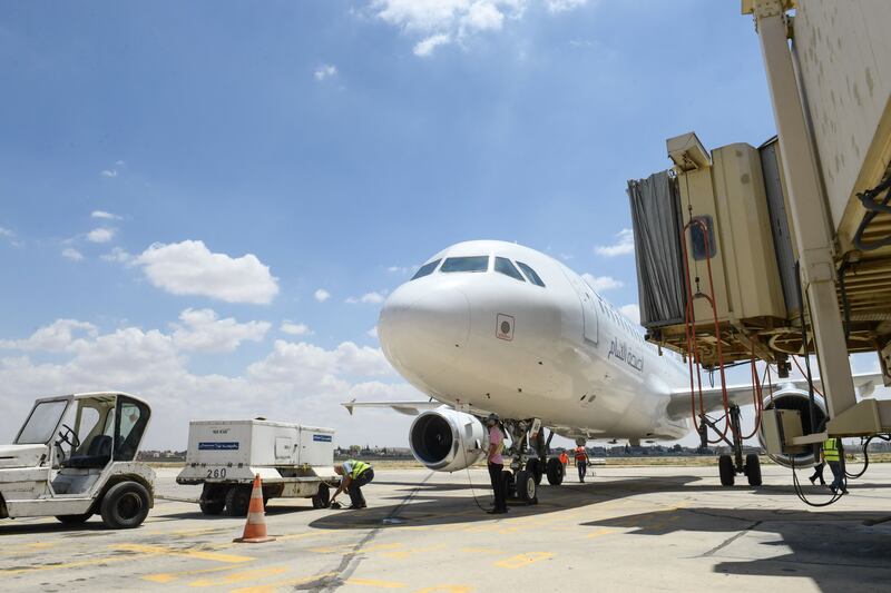 A plane at Syria's Aleppo airport, after flights were diverted from Damascus International Airport following an air strike last June. AFP