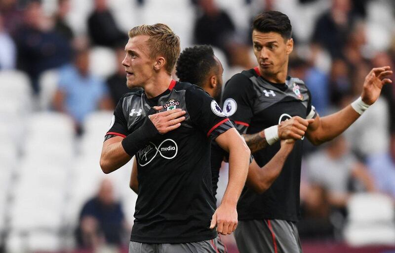 James Ward-Prowse of Southampton, left, celebrates as he scores their third goal against West Ham. Shaun Botterill / Getty Images