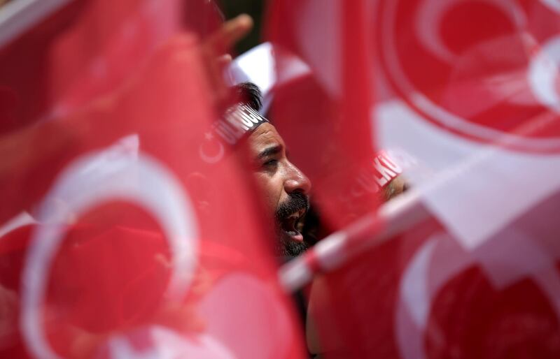 A supporter of Devlet Bahceli, leader of Nationalist Movement Party (MHP), attends an election rally in Ankara, Turkey, on June 23, 2018. Stoyan Nenov / Reuters