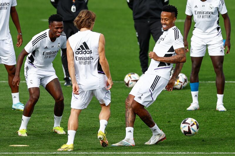 Vinicius Jr, Luka Modric and Eder Militao during training. EPA