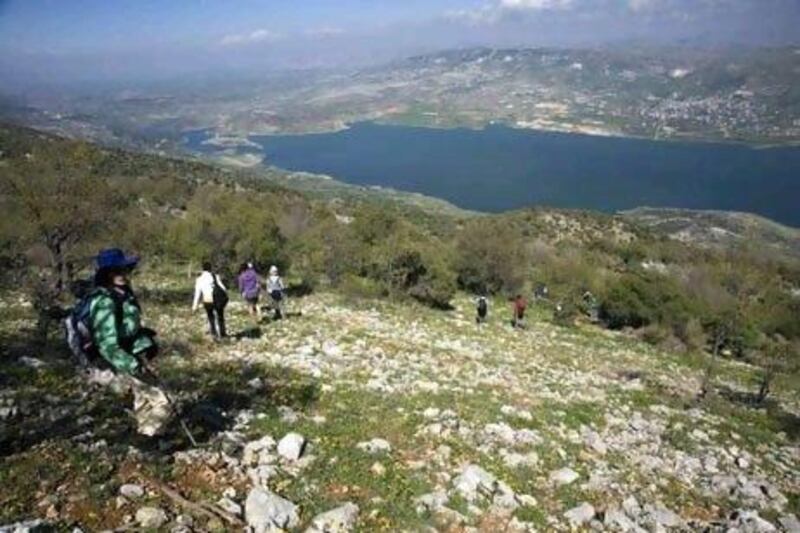 Hikers descend from the Chouf mountains into the Beqaa Valley and Qaraoun Lake in Lebanon.