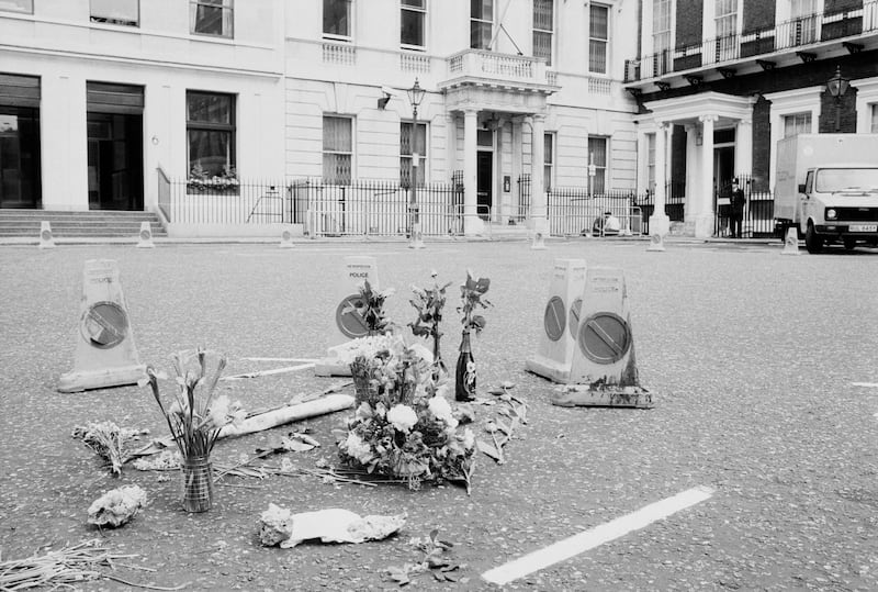 Flowers at the scene where Ms Fletcher was shot outside the embassy