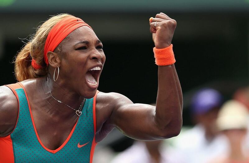Serena Williams of the United States celebrates winning the first set against Li Na of China during their final match at the Sony Open at Crandon Park Tennis Cente on March on March 29, 2014 in Key Biscayne, Florida. Clive Brunskill/Getty Images