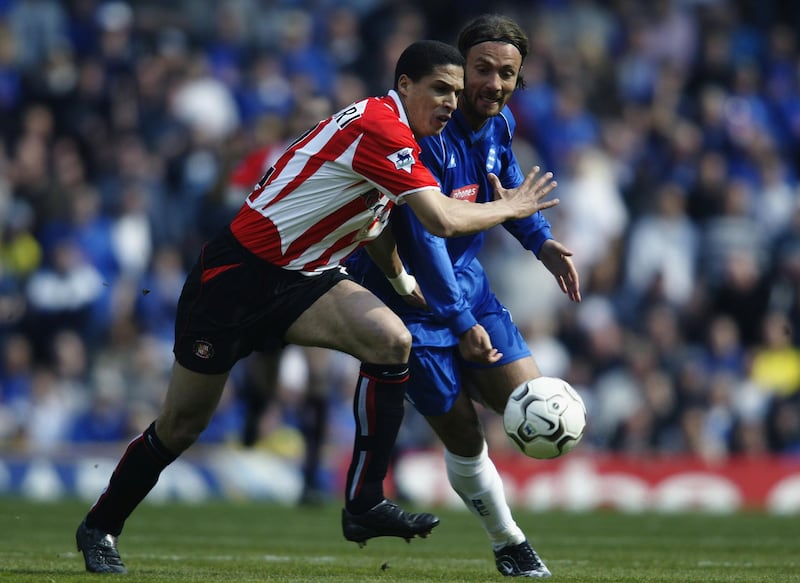 BIRMINGHAM - APRIL 12:  Christophe Dugarry of Birmingham City has his route forward blocked off by Talal El Karkouri of Sunderland during the FA Barclaycard Premiership match held on April 12, 2003 at St Andrews, in Birmingham, England. Birmingham City won the match 2-0. (Photo by Gary M. Prior/Getty Images)